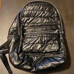 Pink brand black puffer backpack
